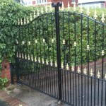 spear head arched double driveway painted gates